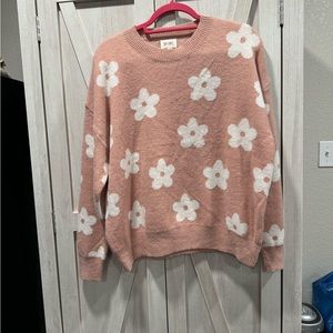 Flower print oversized sweater. Women’s size small like a large as a normal fit.